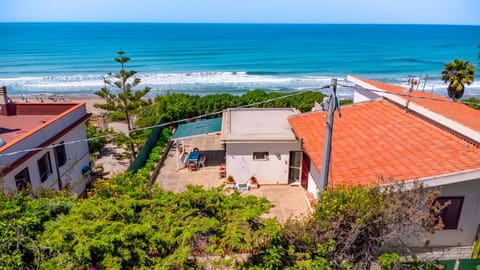 Property building, Day, Natural landscape, Beach, Sea view