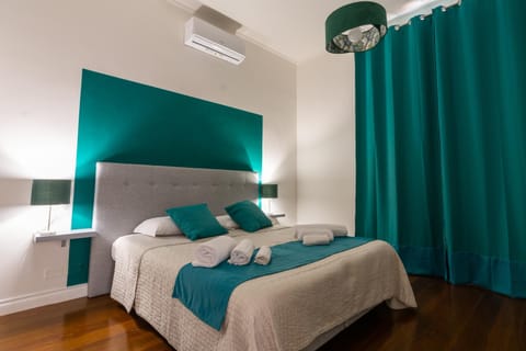 Bed, Photo of the whole room, Bedroom, towels, air conditioner