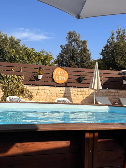 Shower, Seating area, Swimming pool, sunbed