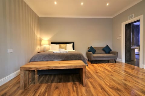 Bed, Seating area, Bedroom