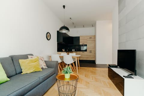 Bed, TV and multimedia, Living room, Seating area, Dining area