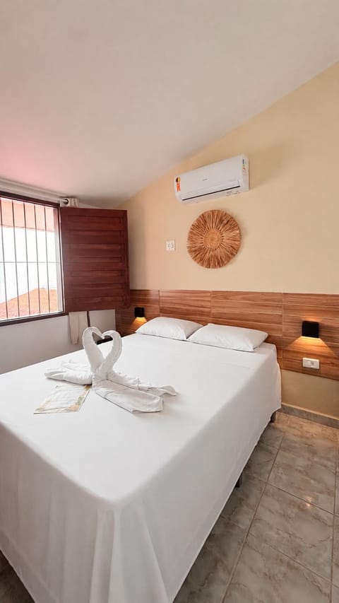 Bed, minibar, air conditioner