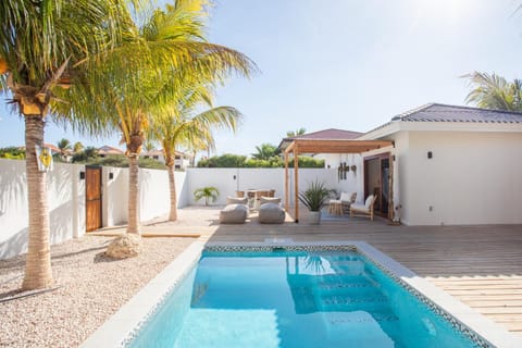 Property building, Day, Pool view, sunbed