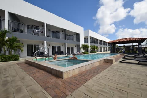 Property building, Day, Pool view, Swimming pool, sunbed