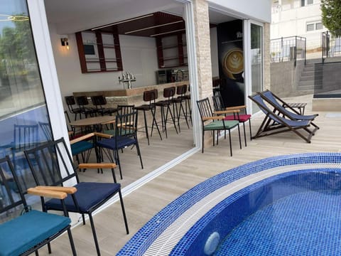 Swimming pool, sunbed