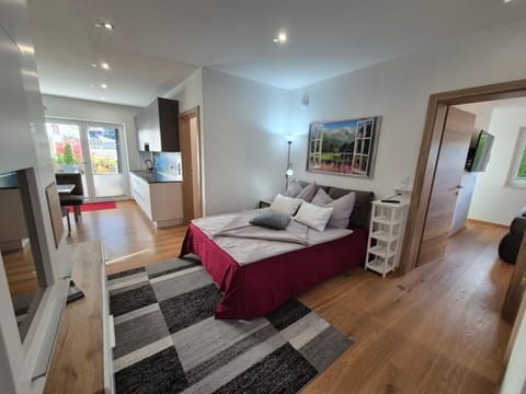 Bed, Living room, Seating area, Evening entertainment