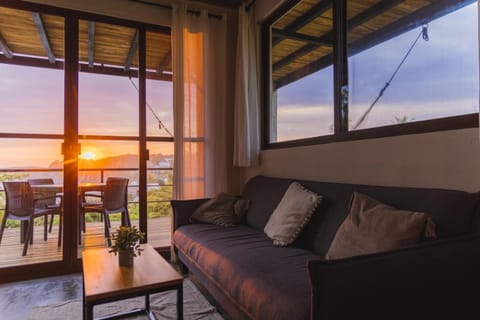 Patio, Natural landscape, View (from property/room), Balcony/Terrace, Living room, Seating area, Dining area, Sea view, Sunset