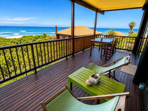 Patio, BBQ facilities, Dining area, Beach, Sea view