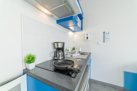 Kitchen or kitchenette, stove