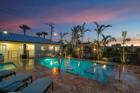 Property building, Patio, Night, Natural landscape, Pool view, Swimming pool, sunbed
