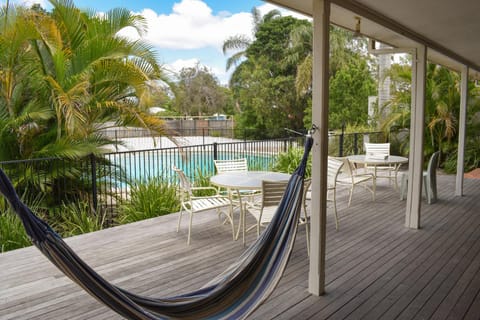 Property building, Patio, Balcony/Terrace, Garden view, Pool view, Swimming pool