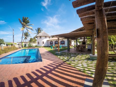 Property building, Patio, BBQ facilities, Garden, Floor plan, Communal kitchen, Garden view, Pool view, Swimming pool, Family, sunbed