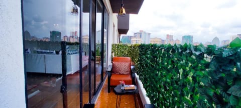 Property building, Communal lounge/ TV room, Day, Garden, View (from property/room), Balcony/Terrace, Living room, Seating area, Evening entertainment, Garden view