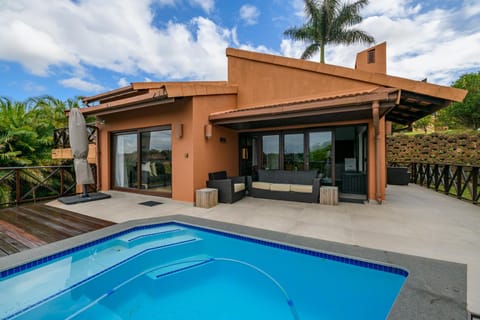 Property building, Patio, Swimming pool