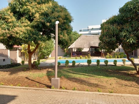 Property building, Garden, Garden, View (from property/room), Garden view, Pool view, Swimming pool