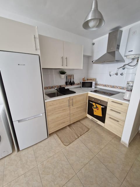 Kitchen or kitchenette, oven