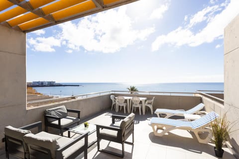 View (from property/room), Balcony/Terrace, Living room, Seating area, Dining area, Sea view