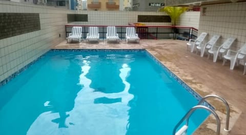 Property building, Pool view, Swimming pool, sunbed