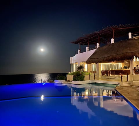 Property building, Night, Natural landscape, Landmark view, Pool view, Swimming pool, sunbed