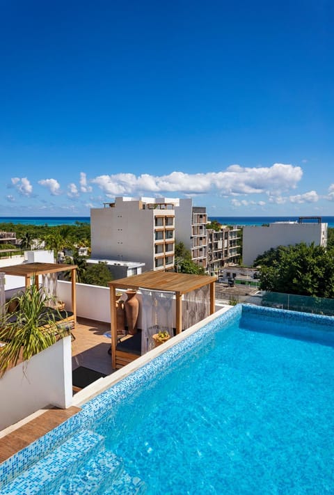 Property building, View (from property/room), Pool view, Swimming pool, sunbed