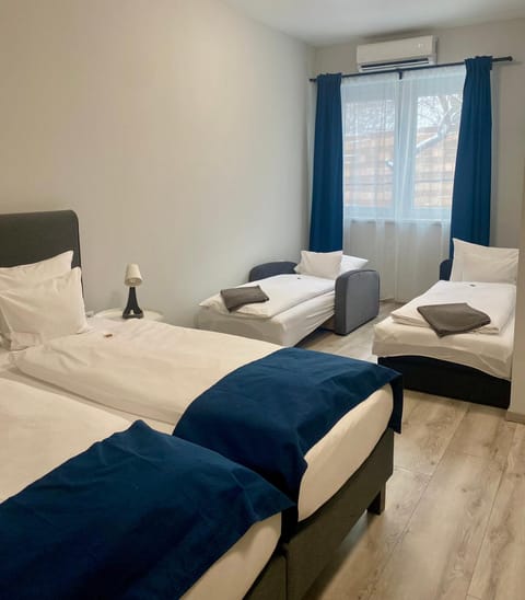 Bed, Photo of the whole room, Bedroom, towels, air conditioner