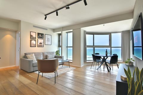 View (from property/room), Living room, Photo of the whole room, Seating area, Dining area, Sea view