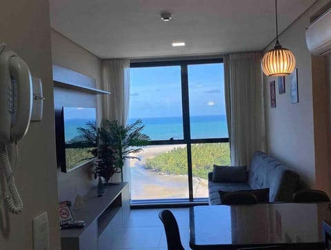 Communal lounge/ TV room, Natural landscape, TV and multimedia, Living room, Seating area, Sea view