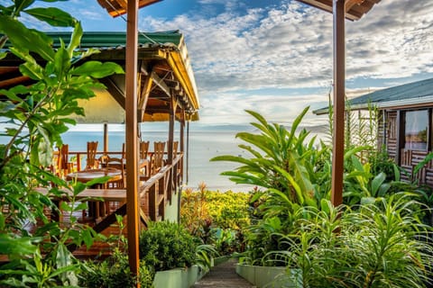 Property building, Day, Natural landscape, Garden, View (from property/room), Dining area, Garden view, Sea view