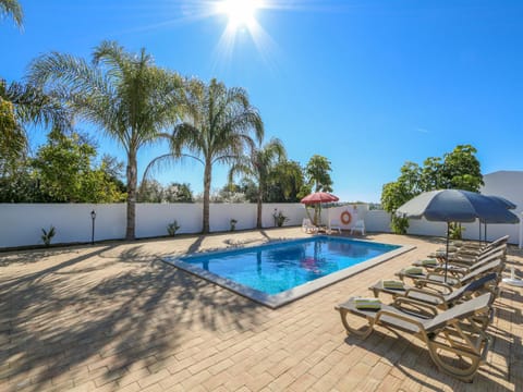 Swimming pool, sunbed