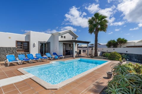 Property building, Living room, Swimming pool