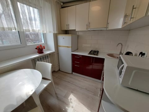 Kitchen or kitchenette, oven, stove
