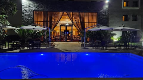 Property building, Night, Pool view, Swimming pool