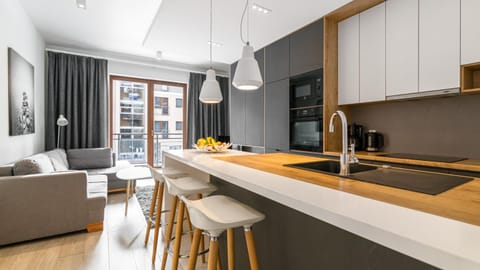 TV and multimedia, Kitchen or kitchenette, Living room, Photo of the whole room, Seating area, Dining area, Garden view