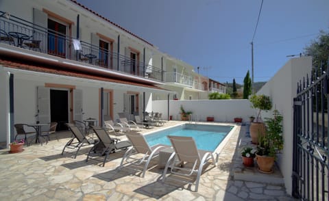 Property building, Patio, Facade/entrance, Swimming pool