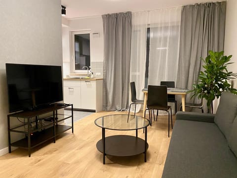 Bed, TV and multimedia, Living room, Seating area, Dining area