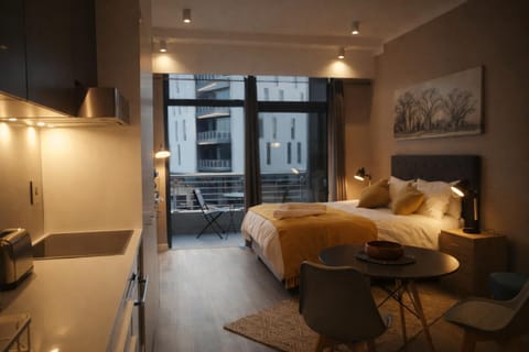 Bed, Kitchen or kitchenette, Living room, Seating area, Dining area, Bedroom