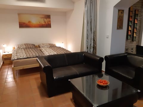 Bed, Living room, Seating area, Bedroom