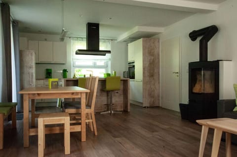 Kitchen or kitchenette, Living room, Seating area, Dining area