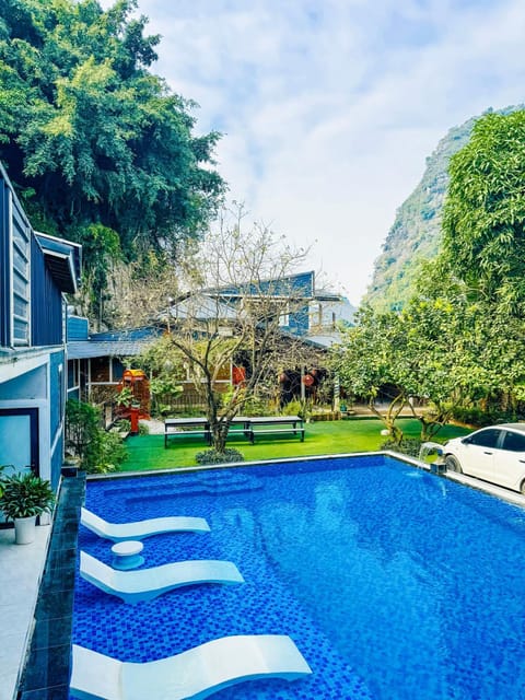 Property building, Natural landscape, Garden view, Pool view, Swimming pool