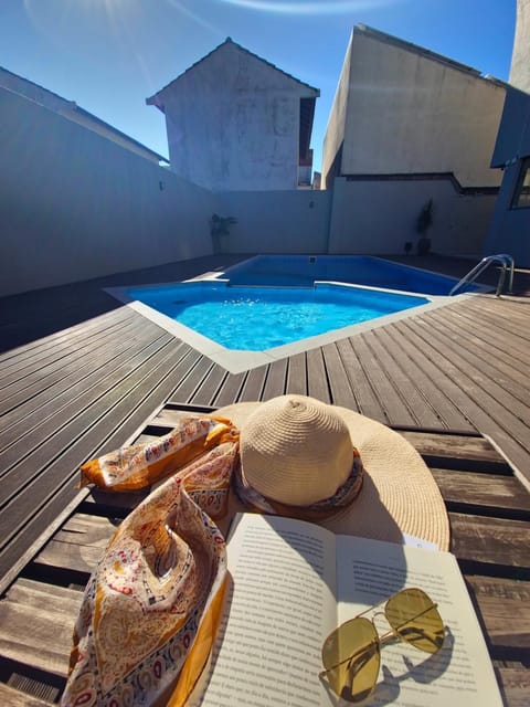 Swimming pool, sunbed