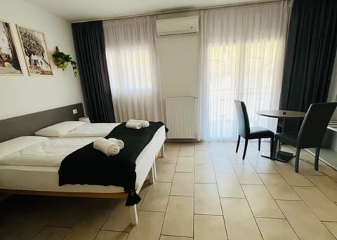 Bed, Bedroom, towels, air conditioner