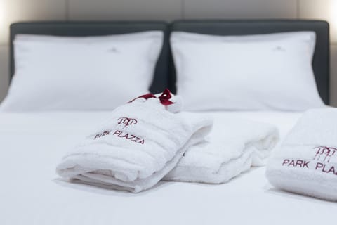 Bed, Property logo or sign, Bedroom