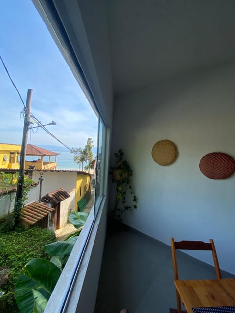 Property building, Patio, Day, Natural landscape, View (from property/room), Kitchen or kitchenette, Sea view