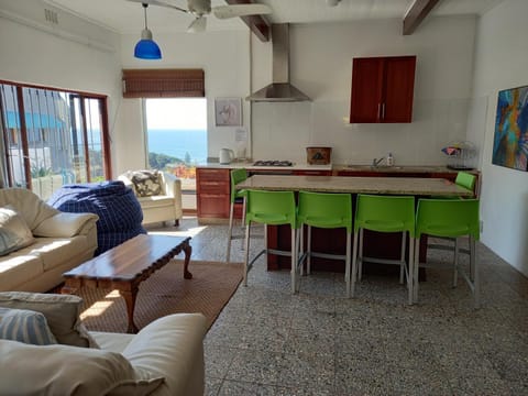 Kitchen or kitchenette, Living room, Seating area, Dining area, Sea view