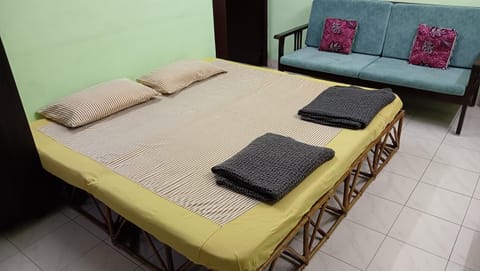 Bed, Living room, Seating area, Bedroom