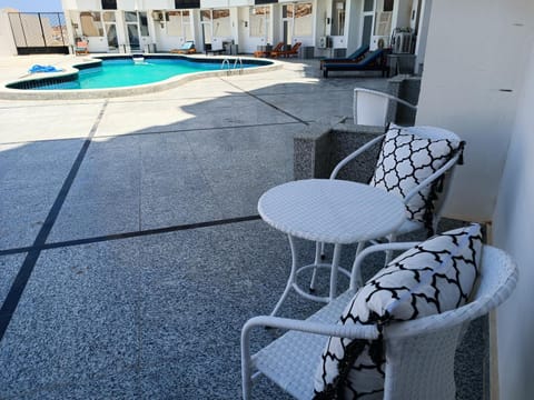View (from property/room), Seating area, Pool view, Swimming pool