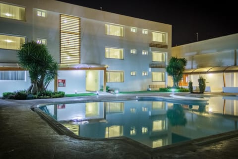 Property building, Night, Swimming pool, Swimming pool