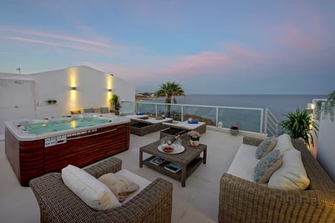 Property building, Patio, View (from property/room), Balcony/Terrace, Spa and wellness centre/facilities, Sea view, sunbed