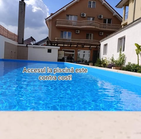 Property building, Day, Pool view, Swimming pool
