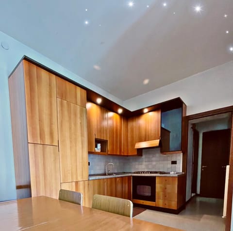 Kitchen or kitchenette, oven, stove